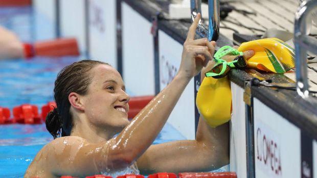 Ellie Cole celebrates winning gold in the 100m backstroke