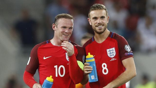 England's Wayne Rooney and Jordan Henderson celebrate after the game