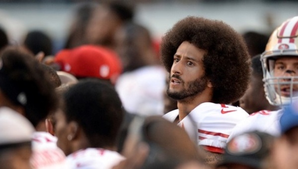 San Francisco 49ers quarterback Colin Kaepernick looks on before the national anthem against the Chargers at Qualcomm Stadium San Diego California