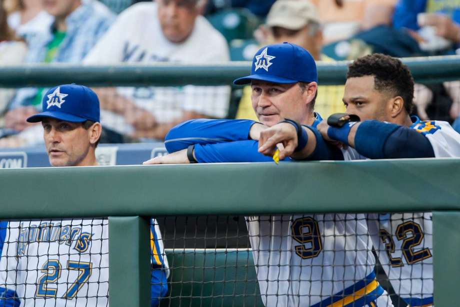 Robinson Cano points out something he noticed on the field to Mariner's manager Scott Servais at Safeco Field