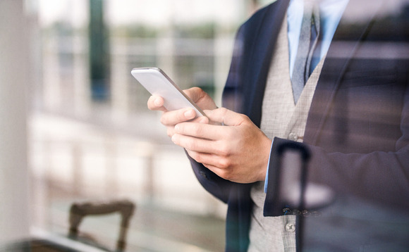 Traveller using smartphone