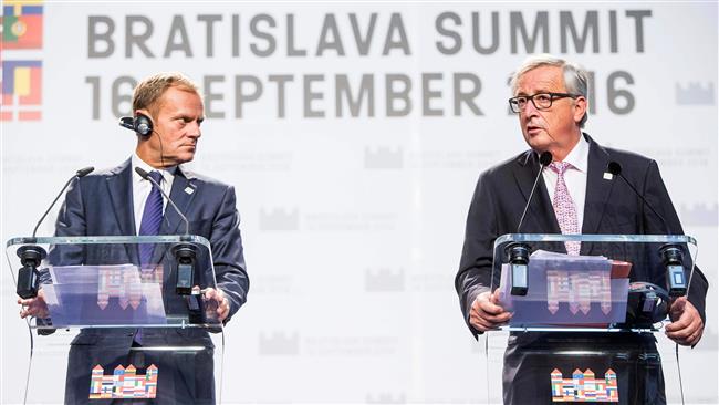 President of the European Commission Jean Claude Juncker and European Council President Donald Tusk deliver a joint statement after the European Union Summit in Bratislava Slovakia