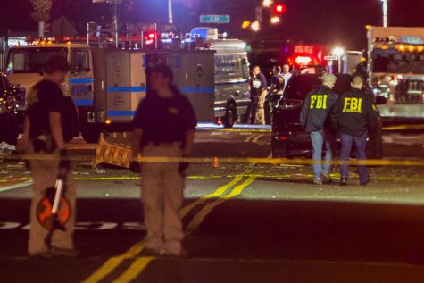 Members of the Federal Bureau of Investigation carry on the investigations in the scene of an explosion on West 23rd Street and 6th Avenue in Manhattan's Chelsea neighborhood in New York early Sunday Sept. 18 2016. An explosion rocked a crowded