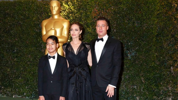 Angelina Jolie and Brad Pitt with son Maddox in 2011