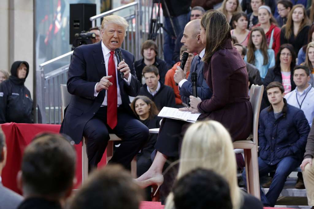 Republican presidential candidate Donald Trump left is interviewed by co-hosts Matt Lauer and Savannah Guthrie on the NBC'Today television program in New York