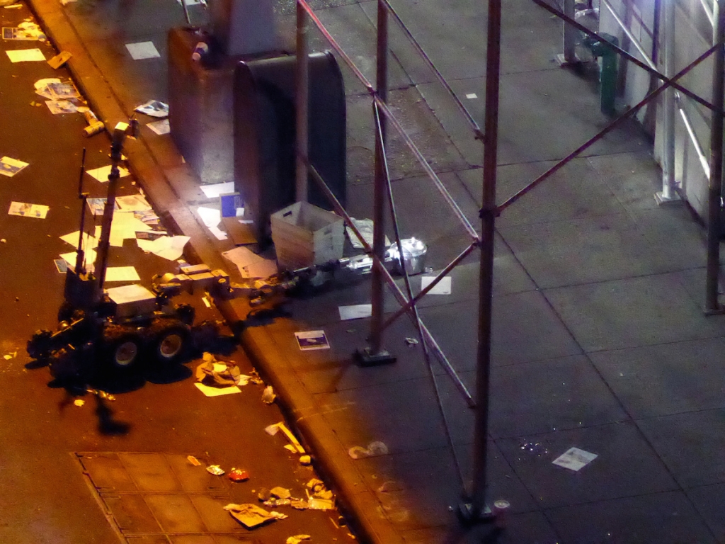 A New York Police Department robot retrieves an unexploded pressure cooker bomb from a sidewalk on 27th Street hours after an explosion nearby in New York City New York