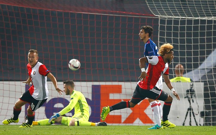 Feyenoord's Tonny Trindade right celebrates after scoring the opening goal during the Group A Europa League match between Feyenoord and Manchester United at the De Kuip stadium in Rotterdam Netherlands Thursday Sept. 15