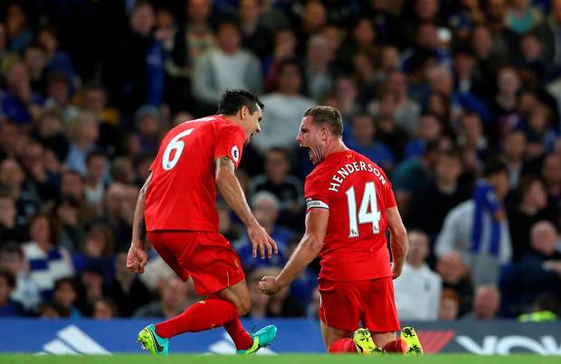 Finishing touch Liverpool’s Jordan Henderson celebrates scoring his side’s second goal of the game at Stamford Bridge