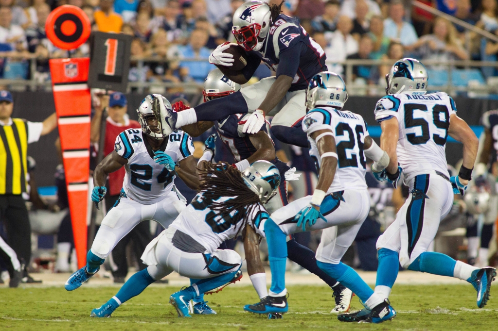 Aug 26 2016 Charlotte NC USA New England Patriots running back Le Garrette Blount leaps over Carolina Panthers free safety Tre Boston during the second quarter at Bank of America Stadium. Mandatory Credit Jeremy Brevard-USA TODAY Sports