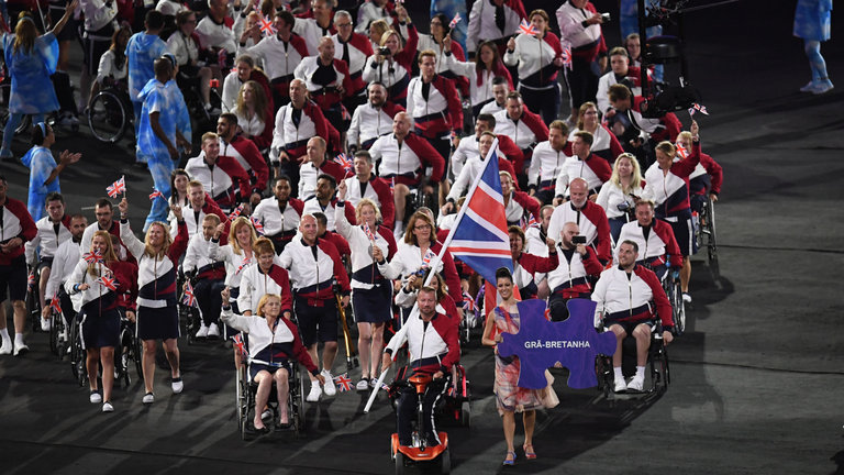 Flagbearer Lee Pearson leads the British Paralympic team