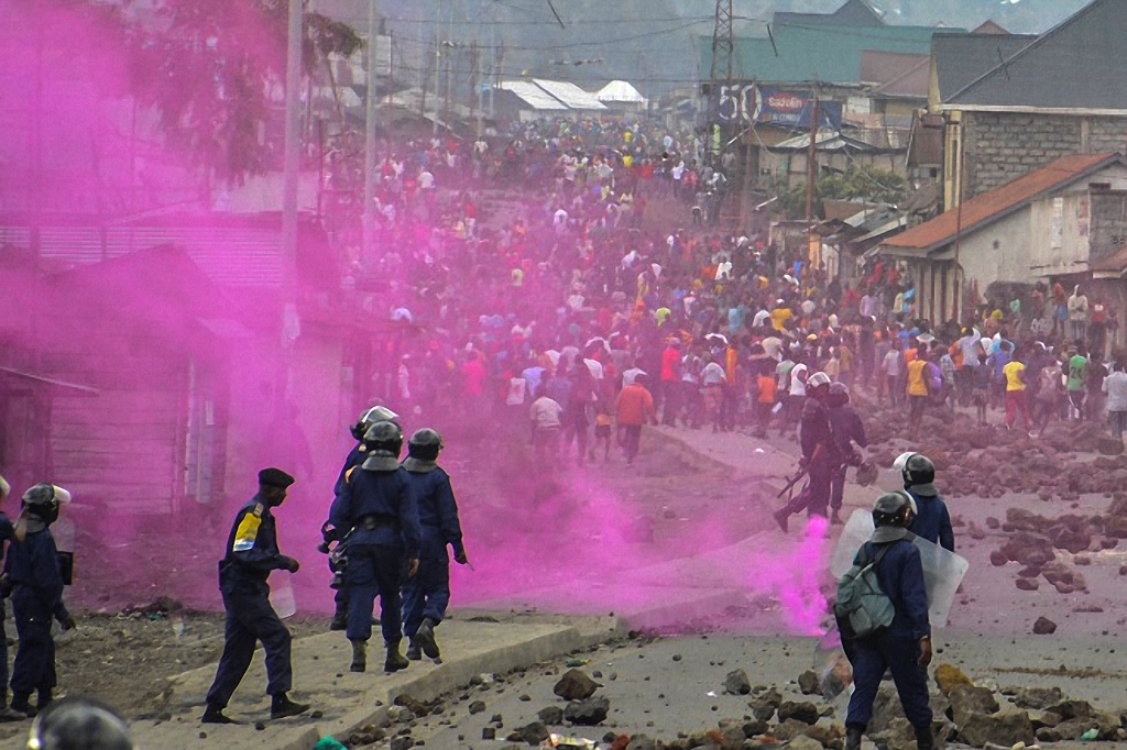 Flares are launched by DRCongo Police forces during a demonstration in Goma