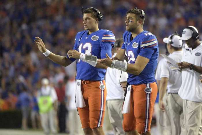 Florida quarterback Austin Appleby and quarterback Feleipe Franks signal in a play from the sideline during the first half of an NCAA college football game against North Texas in Gainesville Fla. Saturday Sept. 17 2016. Phelan M. Ebenhack