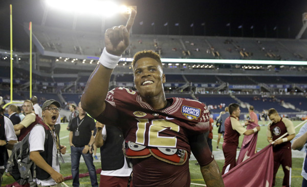 Florida State quarterback Deondre Francois points to cheering fans after defeating Mississippi 45-34 in an NCAA college football game Tuesday Sept. 6 2016 in Orlando Fla