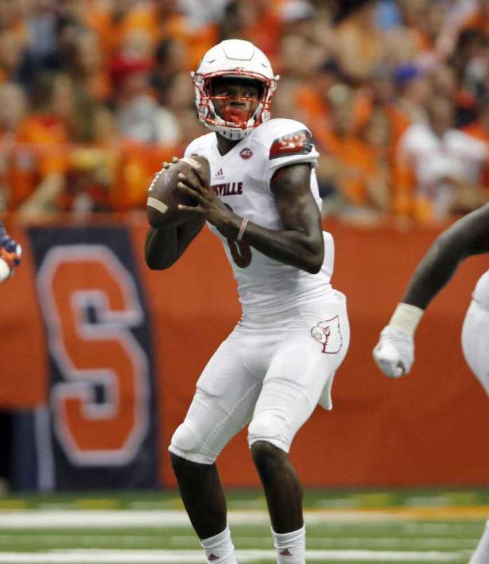 Louisville's Lamar Jackson looks to pass the ball in the first half against Syracuse in Syracuse N.Y. on Friday. The Cardinals won 62-28. Nick Lisi  Associated Press