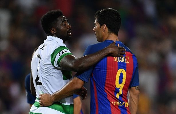 Former Liverpool team-mates Luis Suarez of Barcelona and Kolo Toure of Celtic after the game