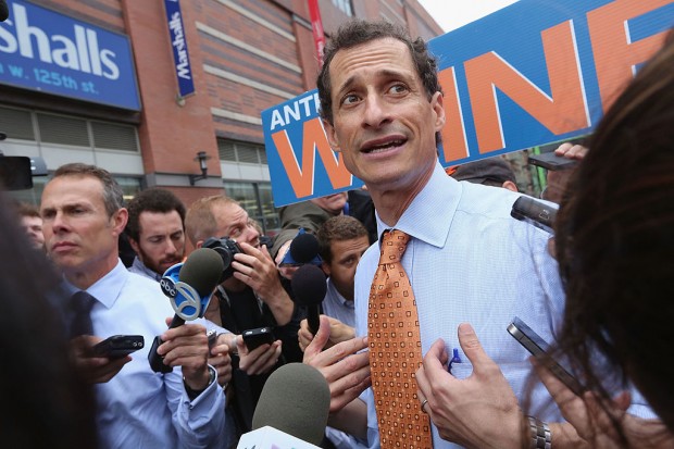 Anthony Weiner is seen outside a Harlem subway station