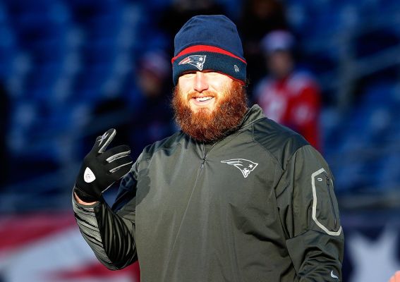 Bryan Stork of the New England Patriots warms