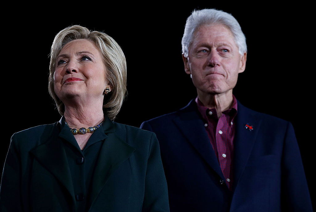 Former Secretary of State Hillary Clinton and her husband former U.S. president Bill Clinton campaign during the primary Feb. 19 2016 in Las Vegas Nevada