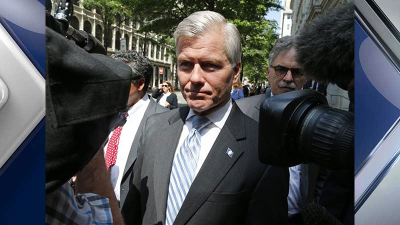 Former Virginia Gov. Bob Mc Donnell navigates a group of cameras as he leaves the 4th U.S. Circuit Court of Appeals after a hearing the appeal of his corruption conviction in Richmond Va. A federal appeals