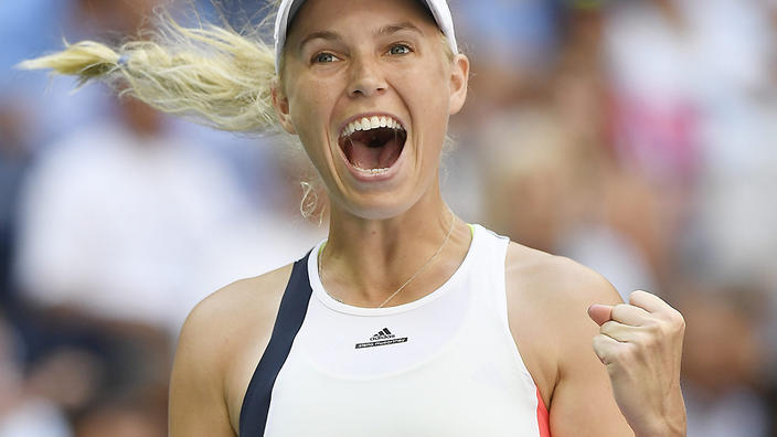 Former world No.1 Caroline Wozniacki has beaten Madison Keys to reach the US Open quarter-finals