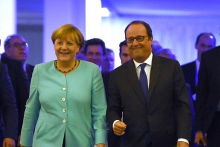 France's Francois Hollande and Germany's Angela Merkel delivered a joint statement at the summit