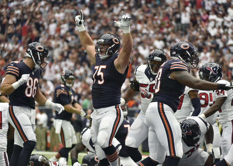 Chicago Bears offensive tackle Kyle Long celebrates a score against the Houston Texans during the first half of an NFL football game Sunday Sept. 11 2016 in Houston