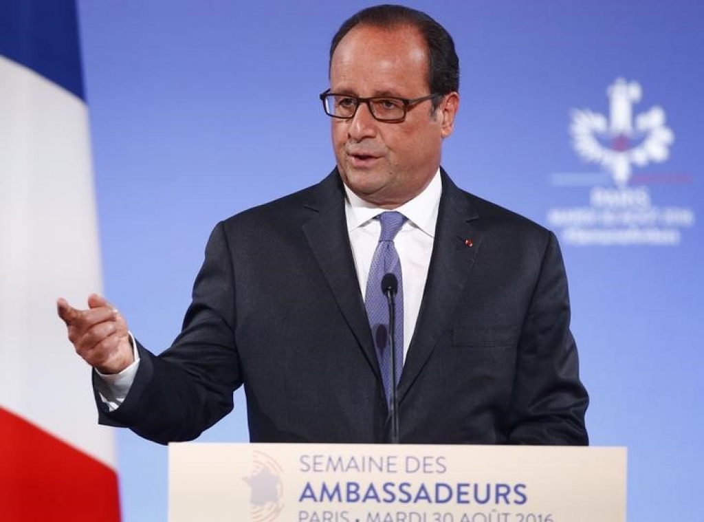 France's Hollande says real risk of escalation in Ukraine