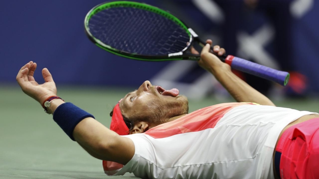 Frenchman Lucas Pouille has beaten Rafael Nadal in five sets to reach the US Open quarter-finals