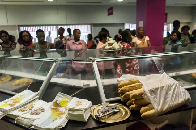 Residents queue at a bakery in the centre of Gabon's capital Libreville