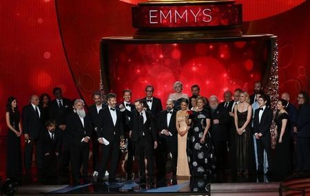 Executive Producers Benioff and Weiss accept the award for Oustanding Drama Series with the cast and crew at the 68th Primetime Emmy Awards in Los Angeles