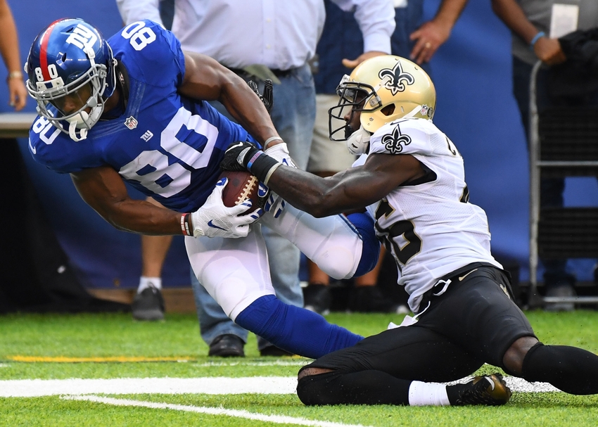 Sep 18 2016 East Rutherford NJ USA New York Giants wide receiver Victor Cruz and New Orleans Saints cornerback Ken Crawley go for a long fourth quarter pass at Met Life Stadium. Mandatory Credit Robert Deutsch-USA TODAY Sports