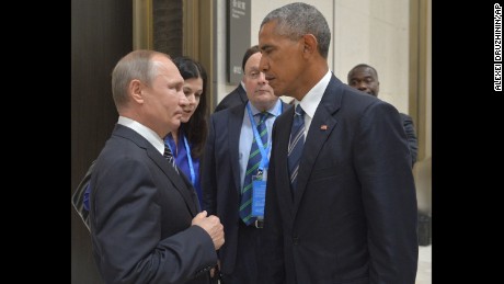 Russian President Vladimir Putin left speaks with U.S. President Barack Obama in Hangzhou in eastern China's Zhejiang province Monday Sept. 5 2016