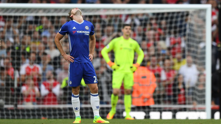 Gary Cahill looks to the sky after Arsenal score