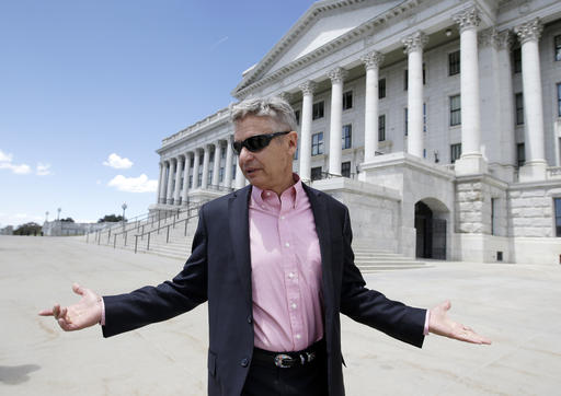 Libertarian presidential candidate former New Mexico Gov. Gary Johnson leaves the Utah State Capitol after meeting with with legislators in Salt Lake City. The day after political