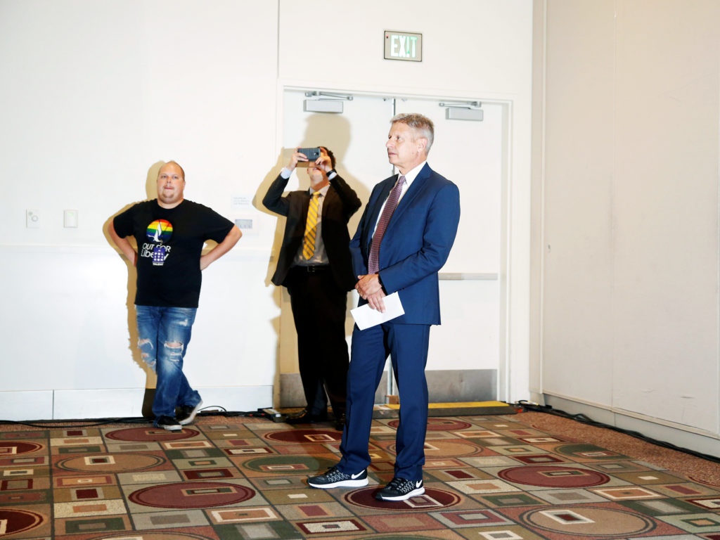 U.S. Libertarian Party presidential candidate Gary Johnson waits to speak on stage at the'Politicon convention in Pasadena California