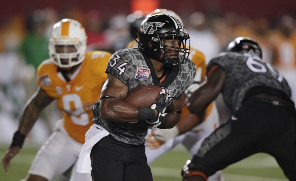 Virginia Tech running back Travon Mc Millian carries the ball against Tennessee during the first half of an NCAA college football game at Bristol Motor Speedway on Saturday Sept. 10 2016 in Bristol Tenn