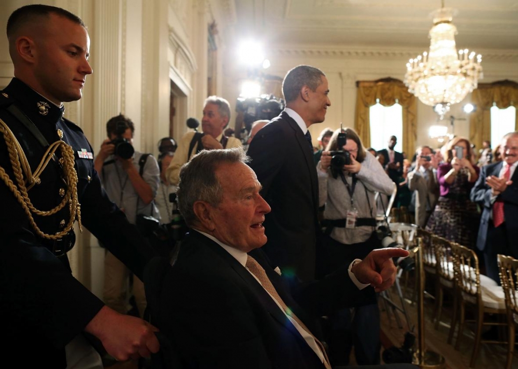 173497378-former-u-s-president-george-h-w-bush-sits-in-a