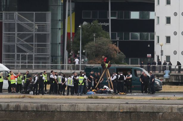 Getty

Emergency services surround protesters at London City Airport