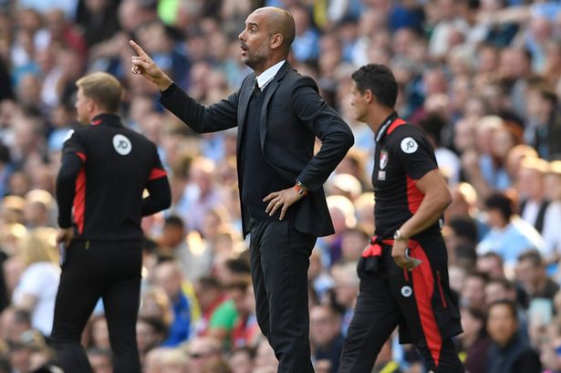 Pep Guardiola gives his team instructions