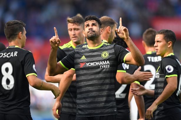 Getty Images

Diego Costa celebrates with team mates as he scores the first goal