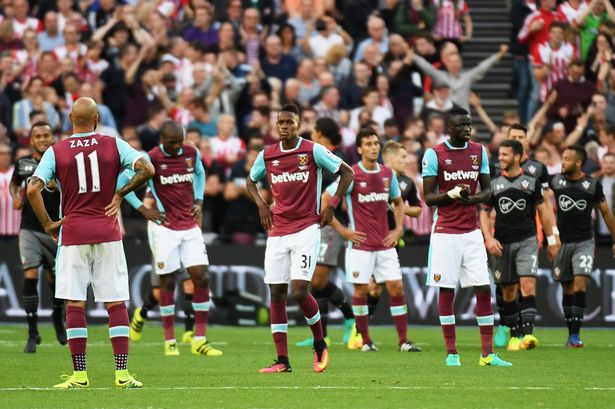 West Ham players look dejected as James Ward Prowse of Southampton scores their third goal