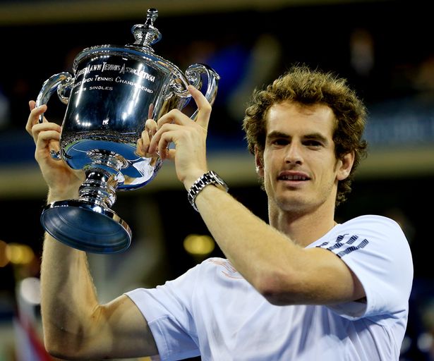 Andy Murray of Great Britain lifts the US Open championship trophy