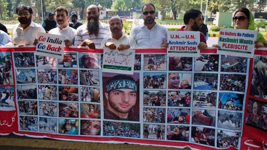 Pakistani supporters of All Parties Hurriyat Conference stand outside the Foreign Office protest in Islamabad Pakistan Wednesday Sept. 21 2016. Protesters gathered to express solidarity with Kashmiris who are resisting Indian rule. (AP