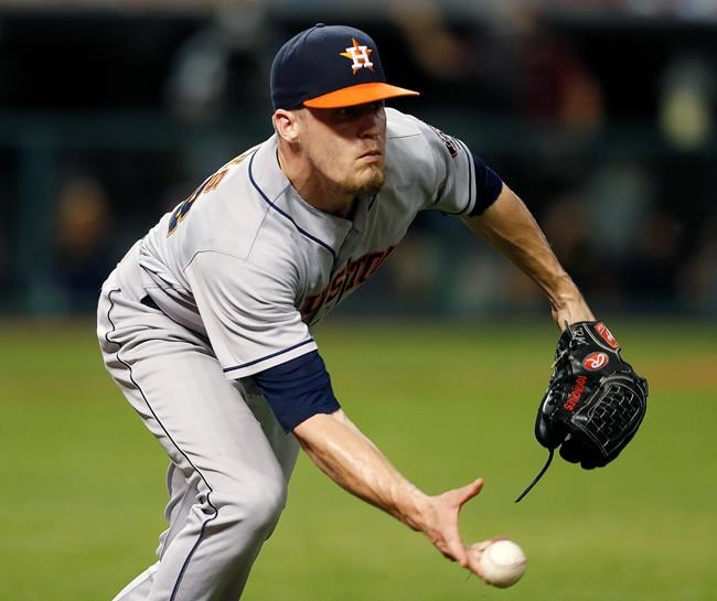 Houston Astros relief pitcher Ken Giles throws out Cleveland Indians&#39 Brandon Guyer at first base during the ninth inning of a baseball game Tuesday Sept. 6 2016 in Cleveland. The Astros won 4-3