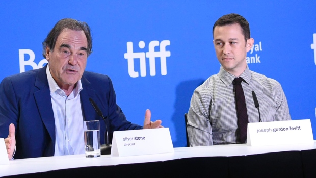 Snowden director Oliver Stone left and star Joseph Gordon Levitt participate in a press conference for the film on Saturday in Toronto the morning after its world premiere at the Toronto International Film Festival