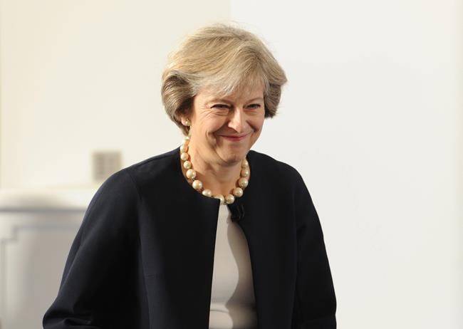 Britain's Prime Minister Theresa May arrives to deliver a speech at the British Academy in London where she said that a new wave of grammar schools will end'selection by house price and give every child the chance to go to a good school Friday Se