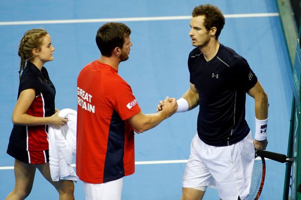 Great Britain's Andy Murray celebrates with captain Leon Smith after winning his match against Argentina's Guido Pella