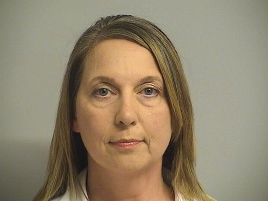 Betty Shelby the Tulsa police officer charged with manslaughter in the killing of an unarmed black man is shown in her arrest