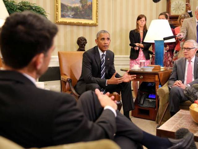 US President Barack Obama speaks during a meeting with Speaker of the House Paul Ryan , Senate Minority Leader Harry Reid , House Minority Leader Nancy Pelosi  and Senate Majority Leader Mitch Mc Connell (not