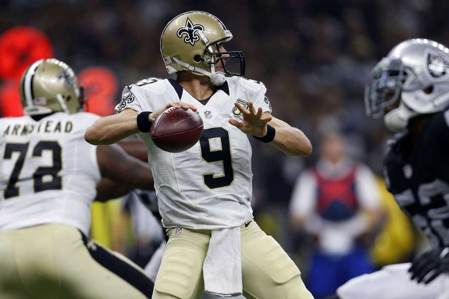 NEW ORLEANS LA- SEPTEMBER 11 Drew Brees #9 of the New Orleans Saints throws the ball during the first half of a game against the Oakland Raiders at Mercedes Benz Superdome